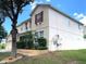 Two story house with landscaping and satellite dish at 963 N Jacks Lake Rd, Clermont, FL 34711