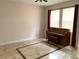 Spacious living room with hardwood floors and large windows at 963 N Jacks Lake Rd, Clermont, FL 34711