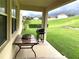 Covered patio with seating area and view of backyard at 963 N Jacks Lake Rd, Clermont, FL 34711