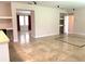 Open concept living area with a view into the kitchen at 963 N Jacks Lake Rd, Clermont, FL 34711
