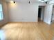 Large living room with bamboo flooring at 963 N Jacks Lake Rd, Clermont, FL 34711
