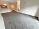 Dining room with carpet flooring and kitchen pass-through at 4881 Cypress Woods Dr # 3213, Orlando, FL 32811