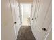 Hallway with carpet flooring and access to bedrooms and bathrooms at 4881 Cypress Woods Dr # 3213, Orlando, FL 32811