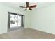 Bedroom with sliding glass doors leading to balcony at 14126 Fox Glove St, Winter Garden, FL 34787