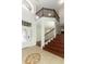 Two-story foyer with hardwood floors and staircase at 14126 Fox Glove St, Winter Garden, FL 34787