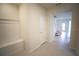 Entryway with built-in bench and storage, leading to the interior at 1264 Blue Island Drive, Clermont, FL 34714