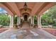 Grand entryway with arched ceilings and columns at 6324 Deacon Cir, Windermere, FL 34786