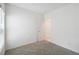 Spacious bedroom with access to bathroom and natural light at 1833 Ross Hammock Ave, Groveland, FL 34736