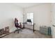 Bedroom with a workspace setup and ample natural light at 1833 Ross Hammock Ave, Groveland, FL 34736