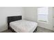 Bright bedroom with double door closet and carpet flooring at 1833 Ross Hammock Ave, Groveland, FL 34736