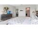 Main bedroom with king bed, dresser, and access to en-suite bathroom at 162 Piave St, Haines City, FL 33844