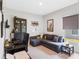 Home office with L-shaped sofa and work desk at 162 Piave St, Haines City, FL 33844