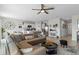 Spacious living room featuring a large sectional sofa and open concept design at 162 Piave St, Haines City, FL 33844