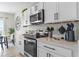 Well-equipped kitchen with stainless steel appliances and ample counter space at 162 Piave St, Haines City, FL 33844