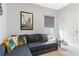 Cozy living room featuring a comfortable sectional sofa and stylish decor at 162 Piave St, Haines City, FL 33844