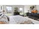Bright main bedroom with a king-size bed, dresser and large windows at 162 Piave St, Haines City, FL 33844