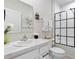 Clean bathroom with white vanity and glass shower at 162 Piave St, Haines City, FL 33844