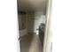 Bathroom with tub, toilet, and dark wood vanity at , Lake Mary, FL 32746
