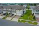 Aerial view of townhouses with landscaped yards and parking at 15259 Willow Arbor Cir, Orlando, FL 32824