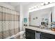 Clean bathroom with granite countertop, shower/tub combo, and updated vanity at 15259 Willow Arbor Cir, Orlando, FL 32824