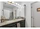 Double vanity bathroom with granite countertops at 15259 Willow Arbor Cir, Orlando, FL 32824