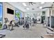 Modern fitness center featuring cardio and strength training equipment at 2210 Lelani Cir, Davenport, FL 33897