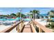 Walkway to a large resort-style pool and lounge area at 2210 Lelani Cir, Davenport, FL 33897