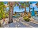 Relaxing beach area with hammocks and lounge chairs at 2210 Lelani Cir, Davenport, FL 33897