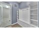 Laundry room with built-in storage and washer/dryer at 2210 Lelani Cir, Davenport, FL 33897