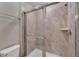 Shower stall with glass enclosure and neutral tile at 2210 Lelani Cir, Davenport, FL 33897