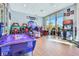Fun game room with air hockey and arcade games at 2210 Lelani Cir, Davenport, FL 33897