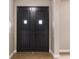 Elegant entryway with double doors and wood flooring at 18645 Seaview St, Orlando, FL 32833
