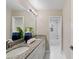Bathroom with granite countertops, double vanity, and shower at 18645 Seaview St, Orlando, FL 32833