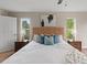 Bright bedroom with king bed and ample natural light from large windows at 18645 Seaview St, Orlando, FL 32833