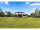 Two-story house with large backyard and screened patio at 18645 Seaview St, Orlando, FL 32833