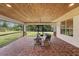 Relaxing screened porch with brick pavers and outdoor seating at 18645 Seaview St, Orlando, FL 32833