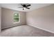Bedroom with neutral walls, carpet flooring, and a ceiling fan at 18645 Seaview St, Orlando, FL 32833