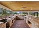 Outdoor kitchen with granite countertops and brick veneer at 18645 Seaview St, Orlando, FL 32833