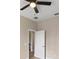 Bedroom with ceiling fan and access to hallway at 18645 Seaview St, Orlando, FL 32833