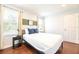 Bedroom with wood floors and a closet at 290 Las Fuentes Dr, Kissimmee, FL 34746
