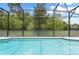 Relaxing screened pool area, perfect for entertaining at 290 Las Fuentes Dr, Kissimmee, FL 34746