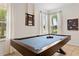 Game room with a pool table, providing entertainment and recreational space at 290 Las Fuentes Dr, Kissimmee, FL 34746