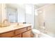 Bathroom with shower, toilet and vanity at 290 Las Fuentes Dr, Kissimmee, FL 34746