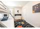 Bedroom with bunk beds and space-themed rug at 290 Las Fuentes Dr, Kissimmee, FL 34746