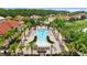 Resort-style community pool with plenty of lounge chairs at 290 Las Fuentes Dr, Kissimmee, FL 34746