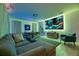 Home theater with large projection screen and comfortable seating for movie nights at 290 Las Fuentes Dr, Kissimmee, FL 34746