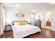 Comfortable bedroom with king-size bed and ensuite bathroom at 290 Las Fuentes Dr, Kissimmee, FL 34746