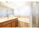 Clean bathroom with tub and shower at 290 Las Fuentes Dr, Kissimmee, FL 34746