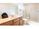 Clean bathroom with a shower/tub combo, vanity, and toilet at 290 Las Fuentes Dr, Kissimmee, FL 34746