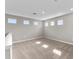 Spacious bonus room with multiple windows and carpet flooring at 2141 Divot Drive Dr, Daytona Beach, FL 32124